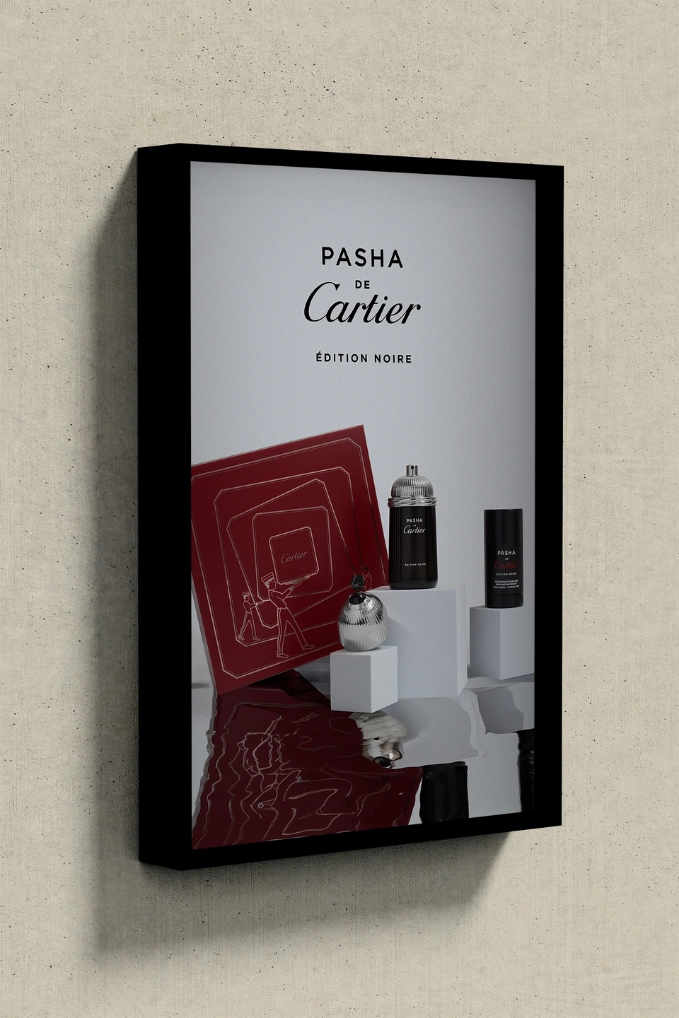 Composición colgada en la pared. Fotografía clara del perfume Cartier PASHA, con el desodorante y la caja en la que viene envuelto. Fondo gris muy claro. Fotografía para la marca de perfumerías Éclair.